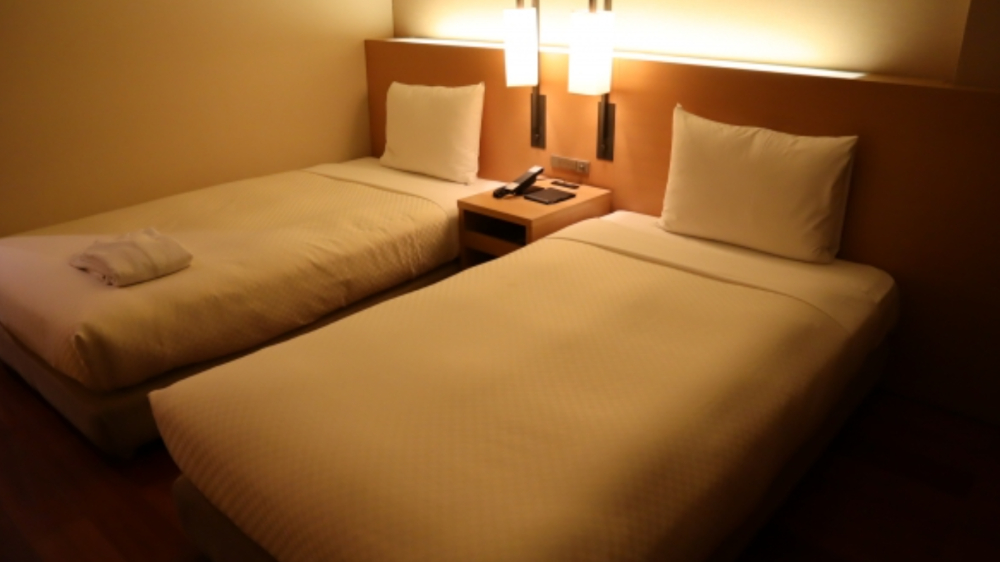 年齢別にホテルを選ぶ家族